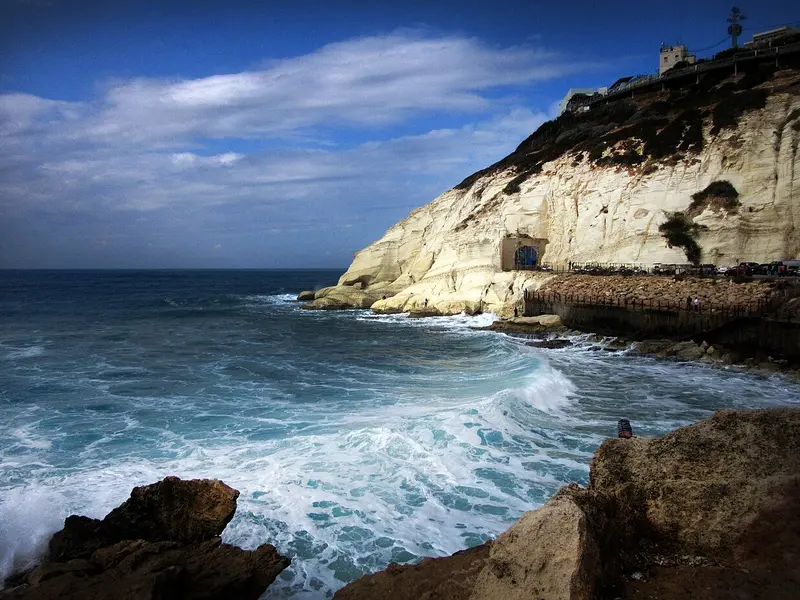 Waves breaking on the white chalk cliffs and rocks at Rosh Hanikra